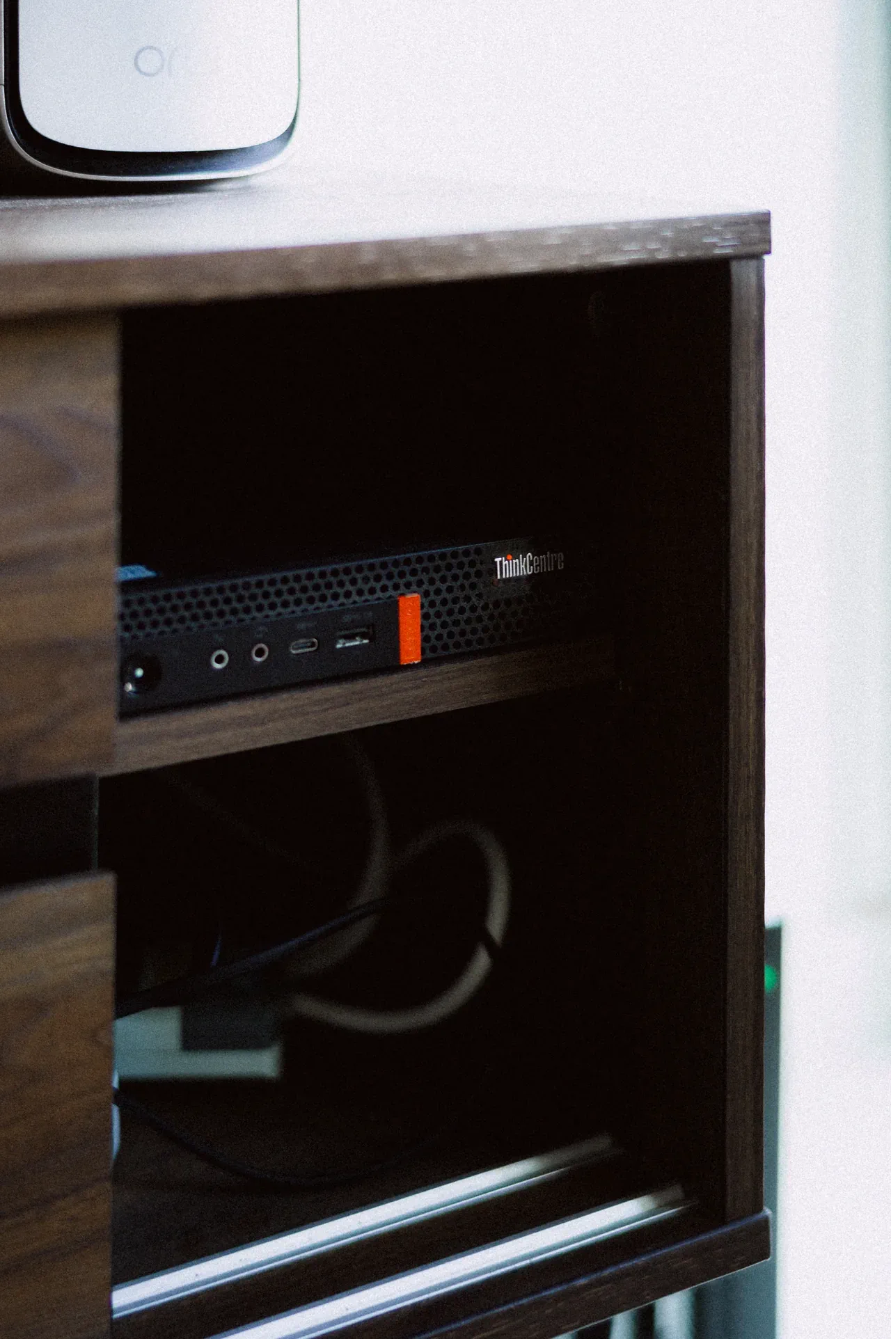 Lenovo ThinkCentre m720q mini PC in the homelab cabinet